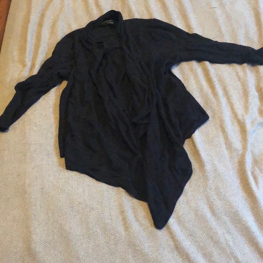 Black polka dot throw over sweater